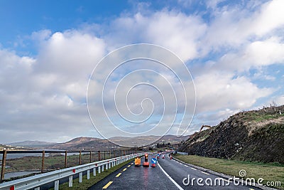 Traffic light counting down at road construction site in County Donegal - Ireland Stock Photo