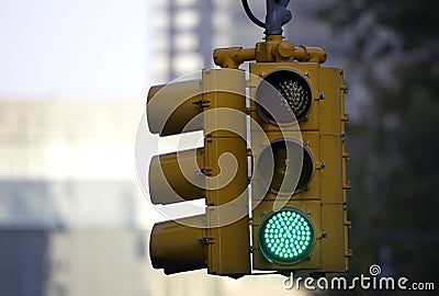 Traffic light on green Stock Photo