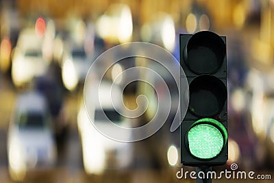 Traffic light green signal and cars Stock Photo