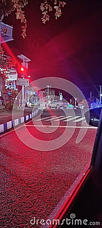 Traffic Light Reflection on Midnight Stock Photo