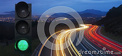 Traffic lights and car lights at night Stock Photo