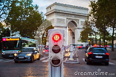 Traffic lights in Paris with Arc de Triomphe in background Editorial Stock Photo