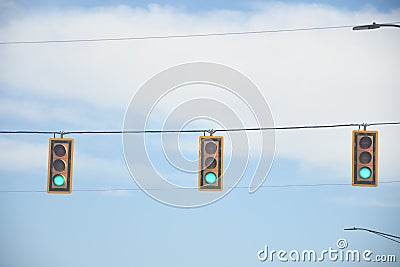 Traffic lights showing an green signal light. Stock Photo