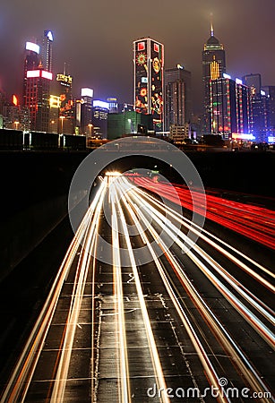 Traffic at night in urban city Stock Photo