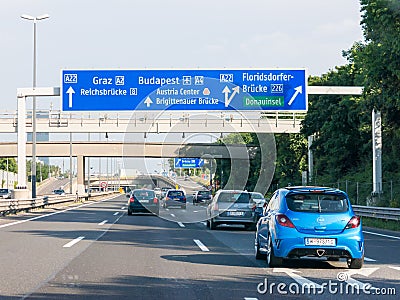 Traffic and road signs on Autobahn A22 in Vienna, Austria Editorial Stock Photo