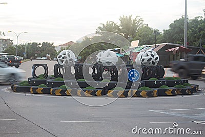 Traffic roundabout with light trails from cars Editorial Stock Photo