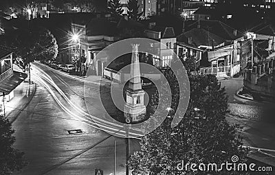 Traffic on roundabout street in city of Vranje at night Editorial Stock Photo