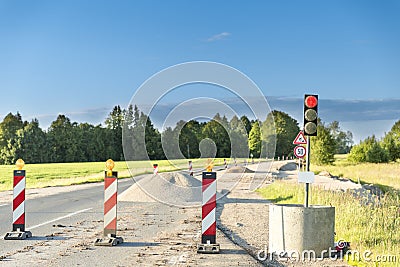 Traffic safety roadwork signs and light on highway Stock Photo