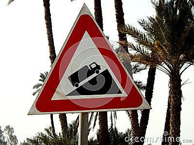 A traffic sign danger steep hill road ahead, a truck on an uphill signal, caution for vehicle drivers to beware of a steep hill in Stock Photo