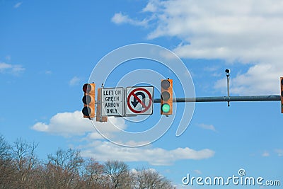 Traffic sign - Left on green arrow only Editorial Stock Photo