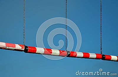 Traffic signs in front of the bridge or the entrance to the garage using plastic rollers hanging over the road on the cuts. warns Stock Photo