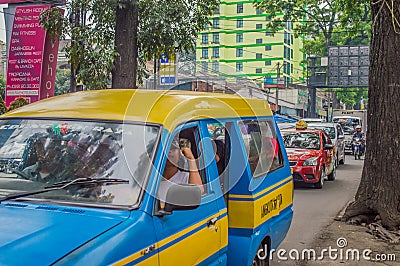 Traffic on a street in one of Jakarta' shopping areas. Editorial Stock Photo