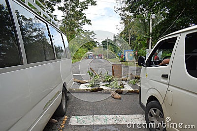 Traffic strike in the middle of the rainforest on the road leading to the city of Almirante, Panama Editorial Stock Photo