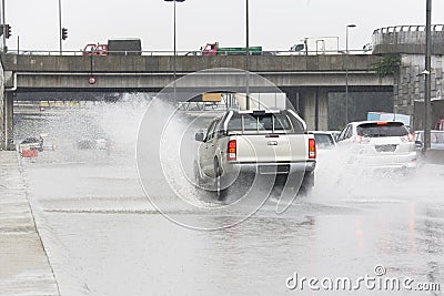 Traffic in Torrential Rain Stock Photo