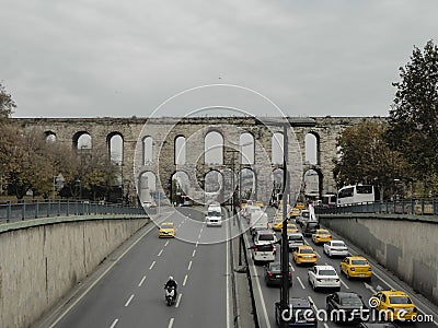 Traffic under Valens Aqueduct in Istanbul, Turkey. Editorial Stock Photo