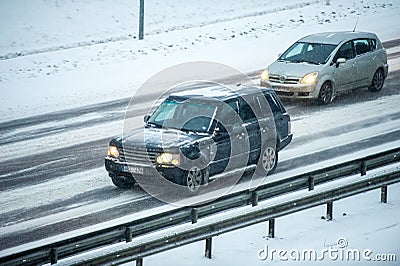 Traffic in Vilnius during winter snowstorm Editorial Stock Photo