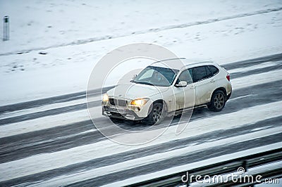 Traffic in Vilnius during winter snowstorm Editorial Stock Photo