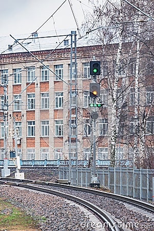 Trafficlight by the railway track Stock Photo