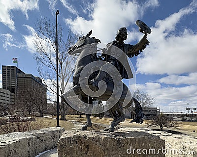 Trail boss of Wagon Train in 'Pioneer Courage' in Pioneer Courage Park in Omaha, Nebraska. Editorial Stock Photo
