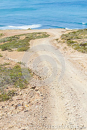 Trail, Cliffs, beach, mountains and vegetation in Canal beach Stock Photo