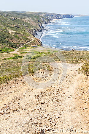 Trail, Cliffs, beach, mountains and vegetation in Canal beach Stock Photo