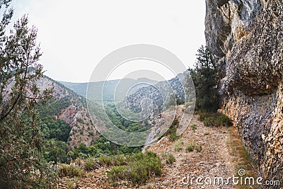 Trail high in the mountains. Dangerous serpentine Stock Photo