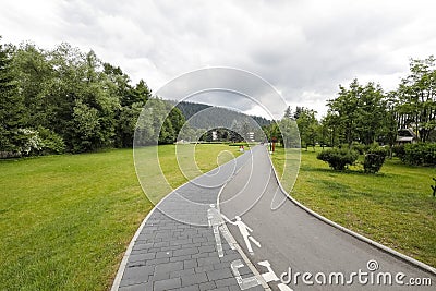 The trail leads through green areas Editorial Stock Photo