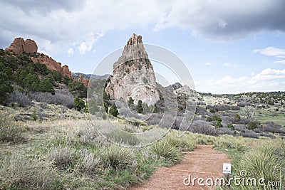 A trail and Praying Hands rock formation in the Garden of the Gods in Colorado Springs. Stock Photo