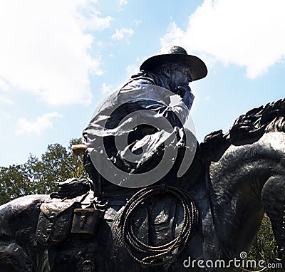 Sculpture of a trail boss on his horse Editorial Stock Photo