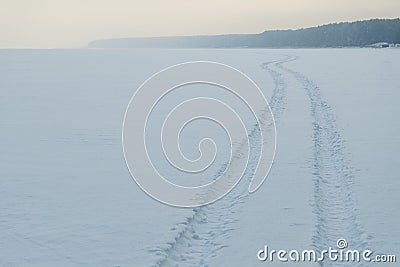 Trail snowy lake Stock Photo