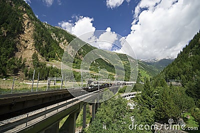 Train through Alps Stock Photo