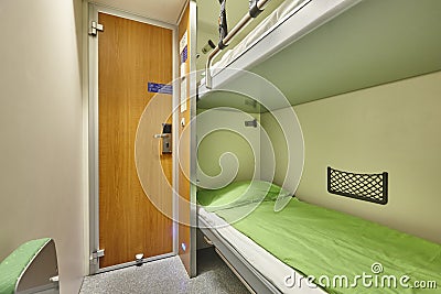 Train berth indoor with two beds. Travel background. Stock Photo