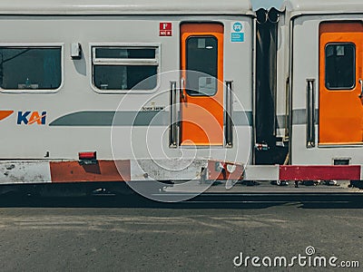 Train carriages at a railroad crossing Editorial Stock Photo