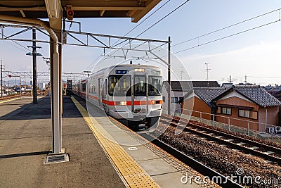 The train coming to the station in Nagoya, Japan Editorial Stock Photo