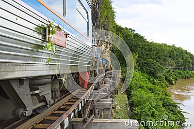 The train commute through the famous The Death railway in Kanchanaburi Editorial Stock Photo