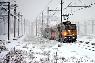 Train driving in severe snowstorm in Amsterdam Netherlands Stock Photo