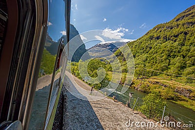 Train between fjords, railroad from Flam to Myrdal in Norway Stock Photo