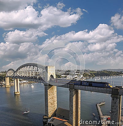 Train going from Cornwall on Royal Albert Bridge designed by Brunel in Plymouth, Devon, England, UK Stock Photo