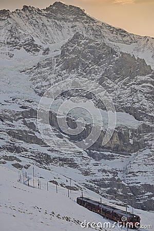 Train of Jungfrau Bahn at Kleine Scheidegg station Editorial Stock Photo