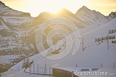 Train of Jungfrau Bahn at Kleine Scheidegg station Editorial Stock Photo