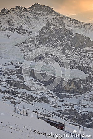 Train of Jungfrau Bahn at Kleine Scheidegg station Editorial Stock Photo