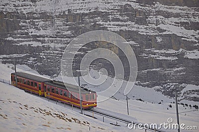 Train of Jungfrau Bahn at Kleine Scheidegg station Editorial Stock Photo