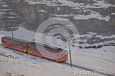 Train of Jungfrau Bahn at Kleine Scheidegg station Editorial Stock Photo