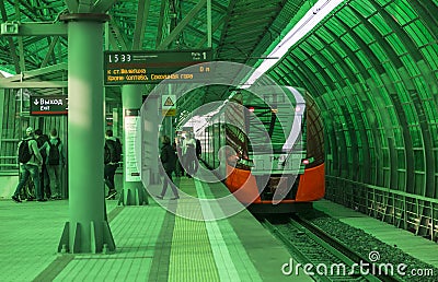 The train Lastochka arrived at the station Business center Moscow Central ring (MCR) Editorial Stock Photo