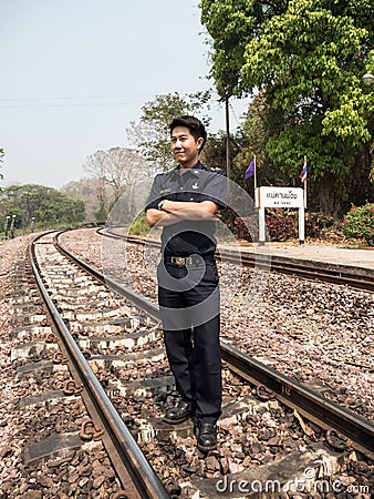 Train Master in Natural Railway Setting Editorial Stock Photo