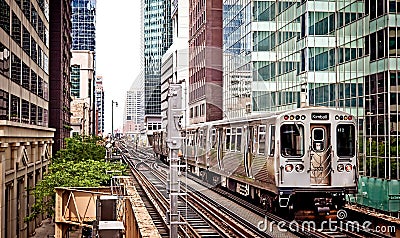 Train moving on the tracks in Chicago Stock Photo