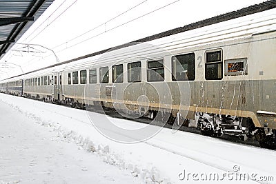 Train of the National Railway Company (CFR) who arrived during a snow storm Editorial Stock Photo