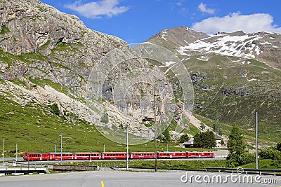 Train near Bernina Diavolezza station on the Bernina Railway line. Editorial Stock Photo