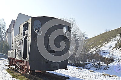 Train locomotive old in snow. Editorial Stock Photo