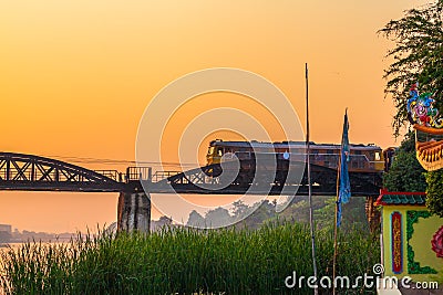 Train passing river Kwai bridge Editorial Stock Photo